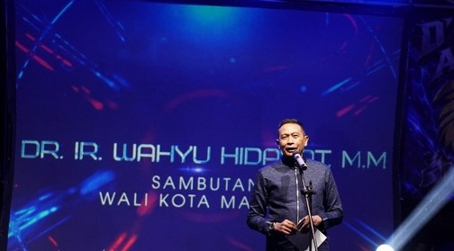 Wali Kota Malang Wahyu Hidayat saat memberi sambutan Nusantara Fest 2026 warga RW 18 Perumahan Bulan Terang Utama (BTU), Kelurahan Madyopuro, Kecamatan Kedungkandang, dalam menggelar Nusantara Fest 2026, Sabtu (5/9/2026). (foto: prokopim)
